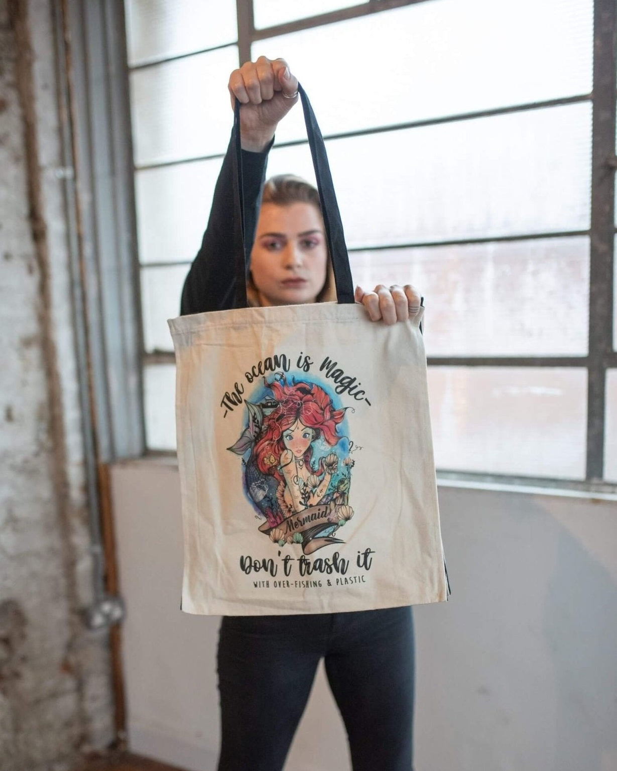 Organic shopper with black handles and gusset. Plastic pollution mermaid design by eco-ethical brand Viva La Vegan