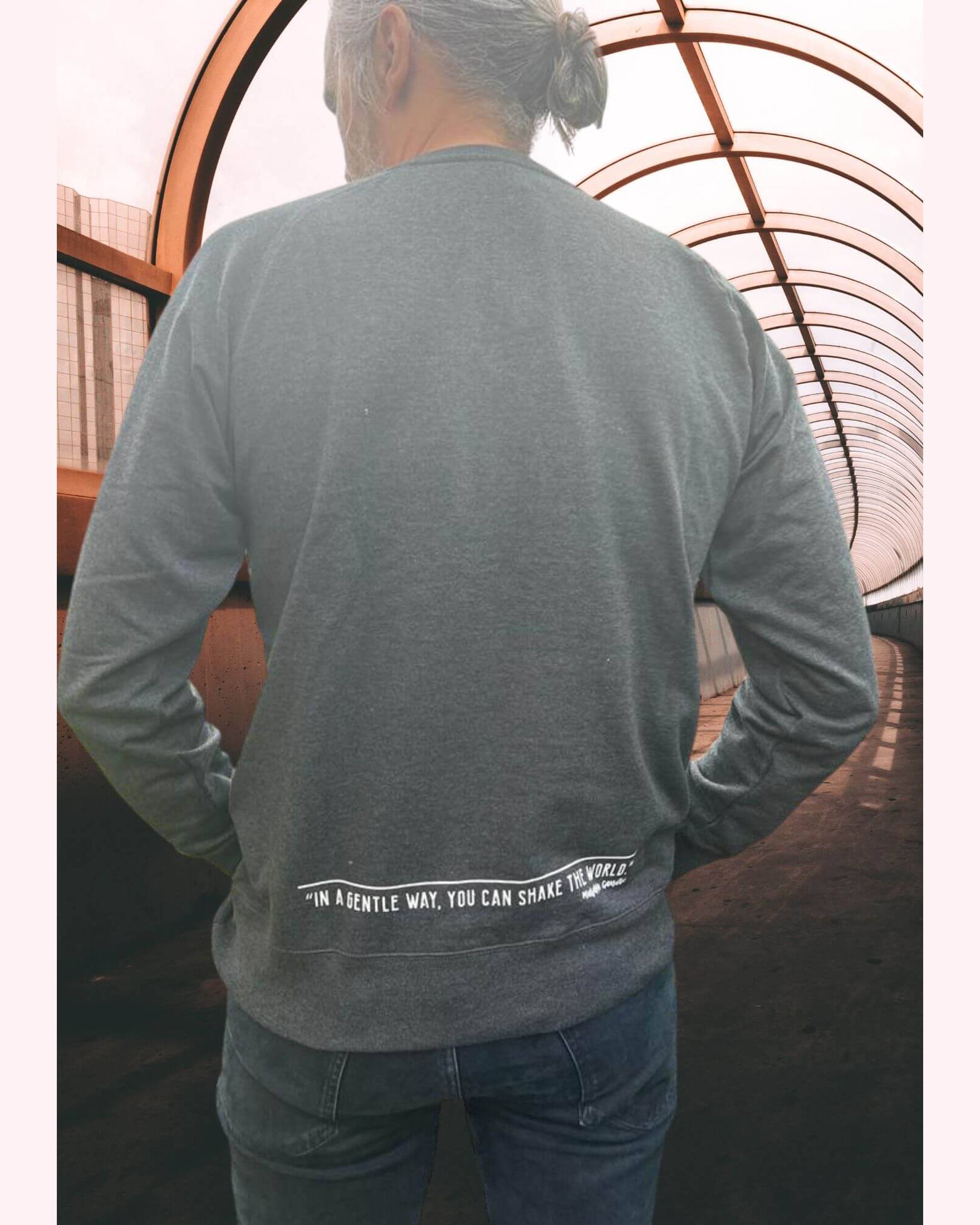 Man Human Kind unisex sweatshirt by Viva La Vegan. Back view. Lower back hem print
