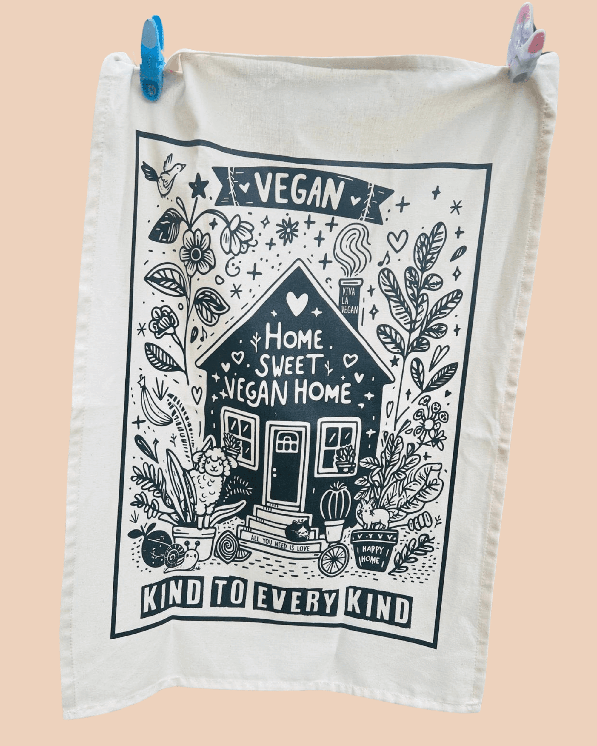 Home Sweet Vegan Home Teatowel hanging up by pegs