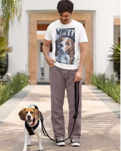 Man walking a beagle wearing brown trousers and a white shirt with a large painted beagle design with the word WHY. By Viva La Vegan