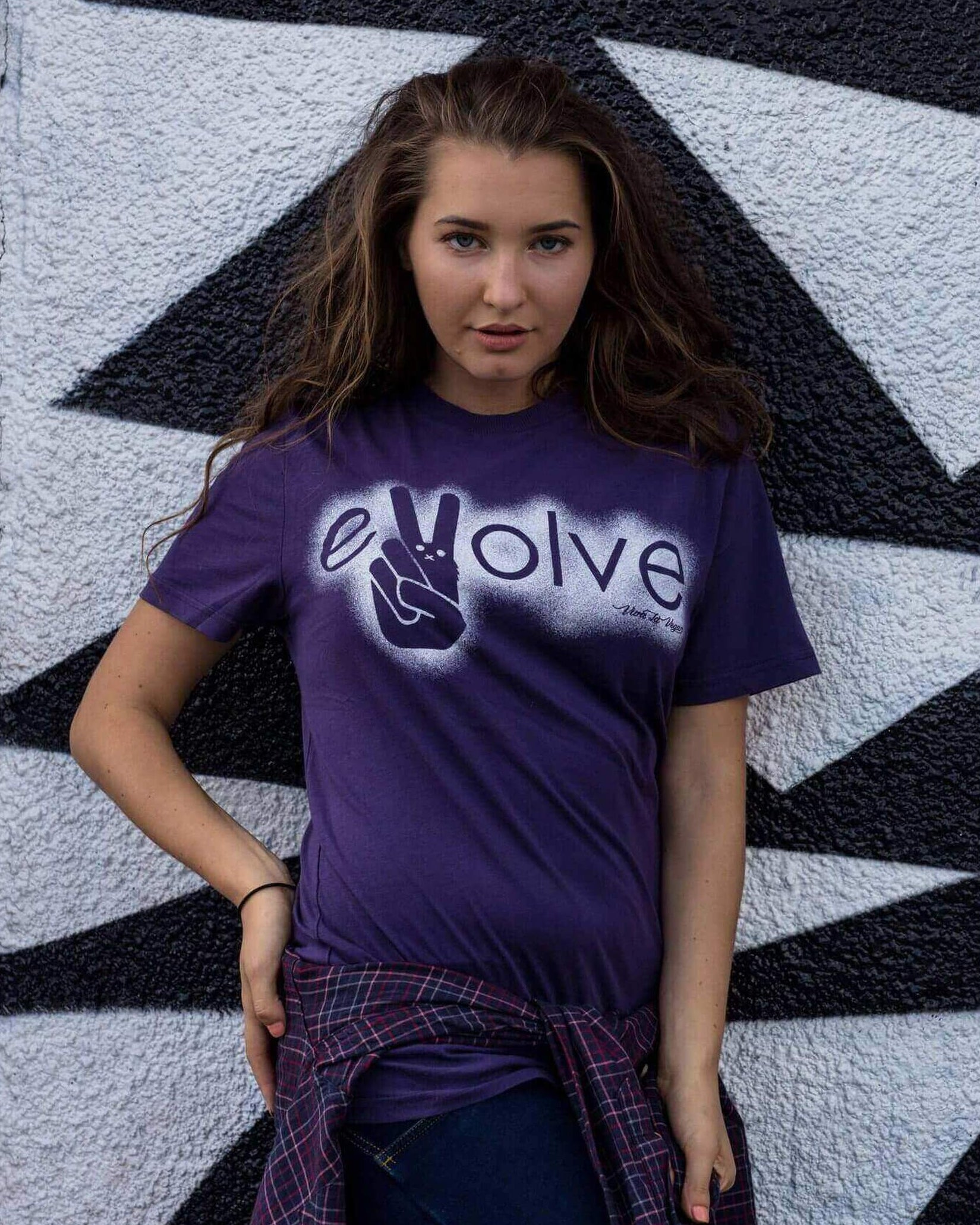gender-women wearing a purple evolve t-shirt