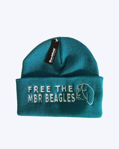 Flat lay of a Free the MBR beagles beanie in teal by Viva La Vegan