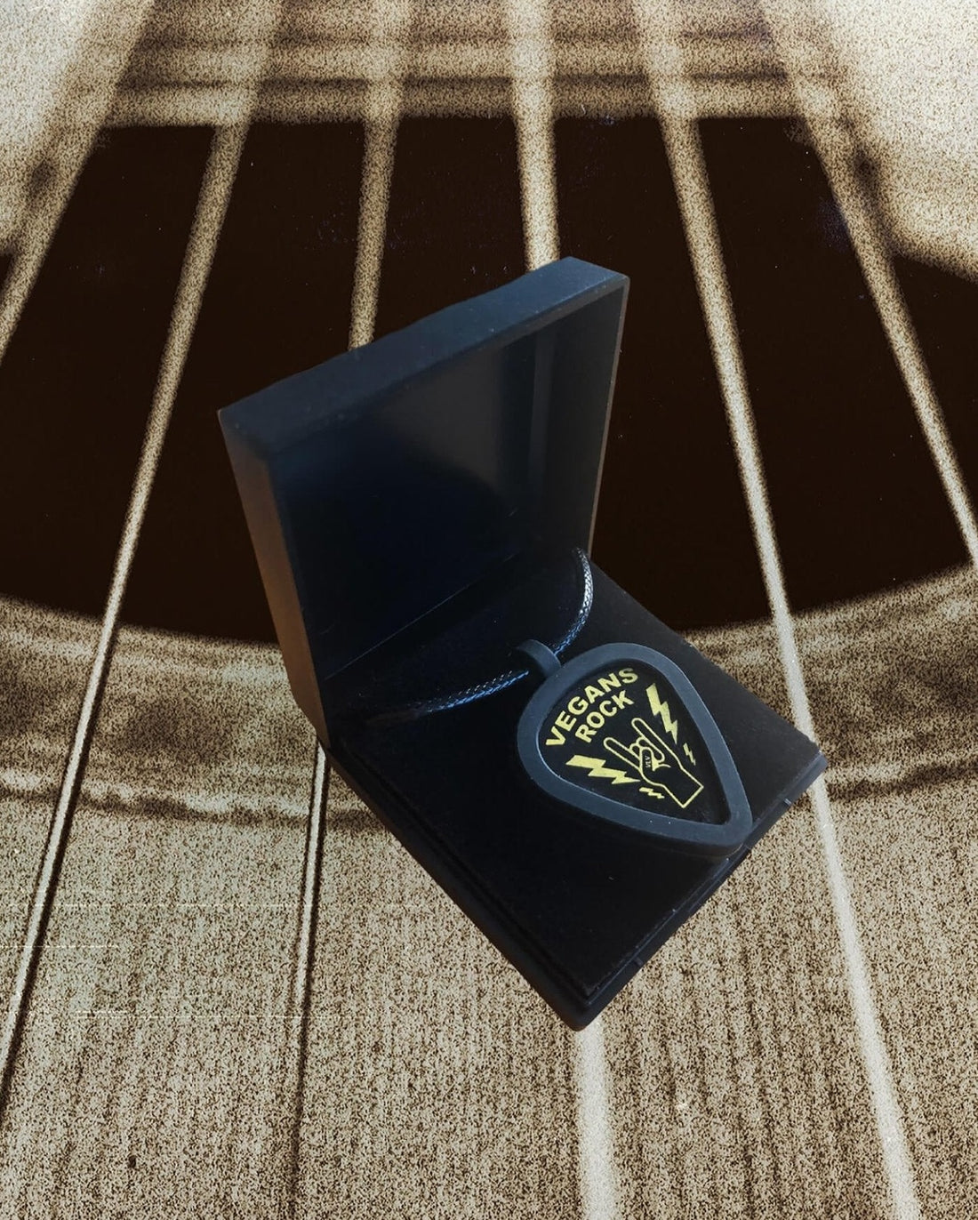 Vegan Plectrum necklace holder in a presentation box by eco-ethical brand Viva La Vegan