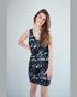 Vegan Model Angel wearing all over print wildlife dress