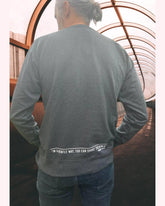 Man Human Kind unisex sweatshirt by Viva La Vegan. Back view. Lower back hem print