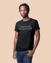 Unisex black t-shirt with roll sleeve. Vegan for life not just for likes. by eco-ethical brand Viva La Vegan