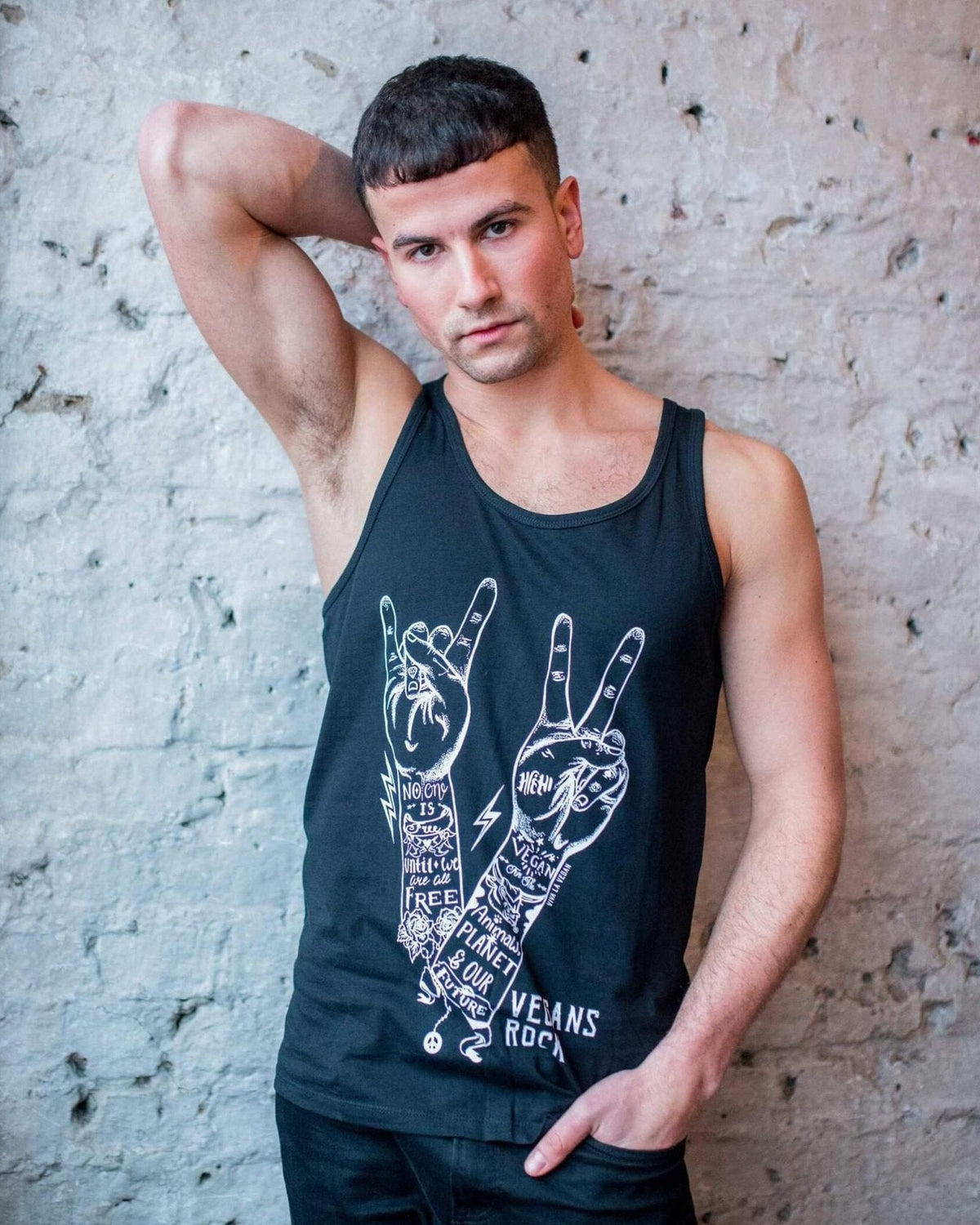 Male Model wearing unisex style Vegans Rock statement organic cotton vest