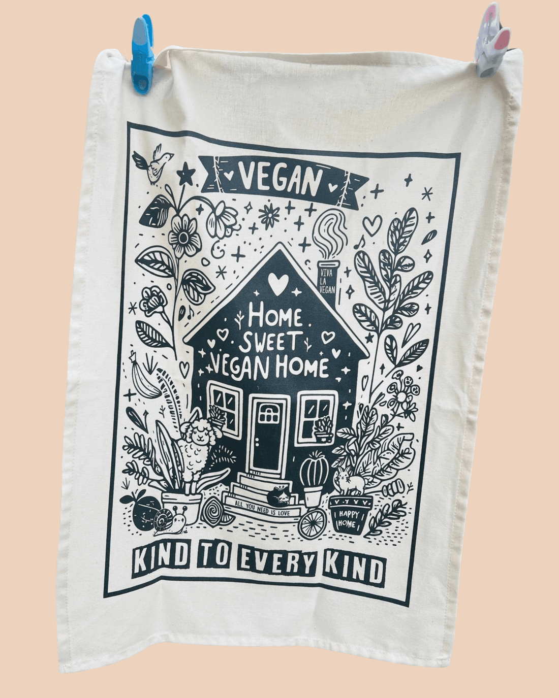 Home Sweet Vegan Home Teatowel hanging up by pegs