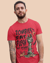 Male model standing against a wall and wearing Viva La Vegan&